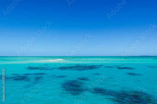 beautiful great barrier reef with white clouds on a sunny day  cairns  australia