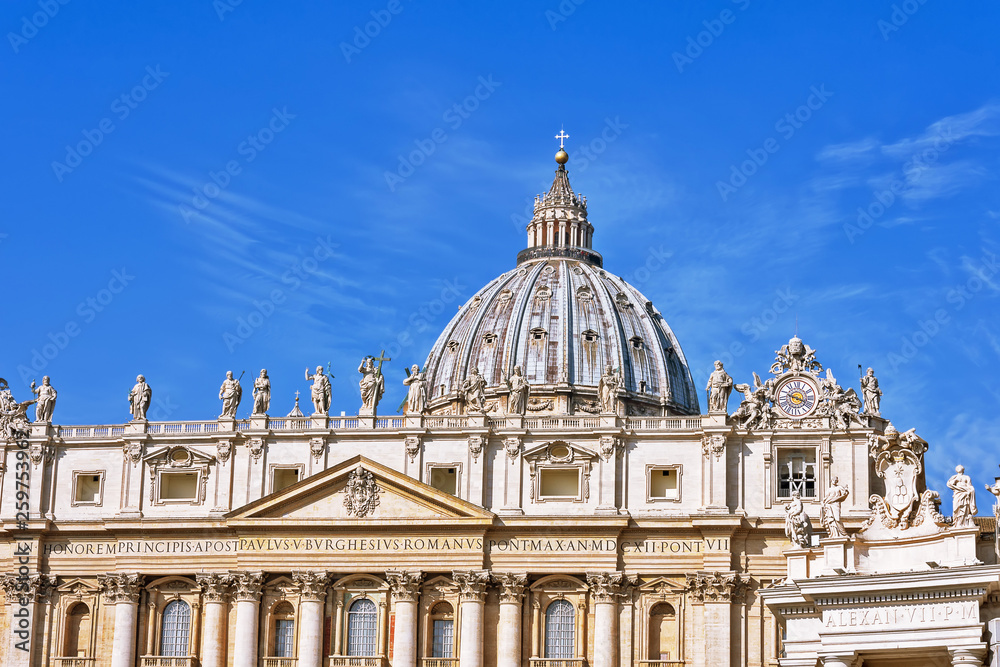 VATICAN CITY, VATICAN, Italy - March 2019: Fragments of the Papal Basilica of St. Peter (San Pietro Piazza) in the Vatican and columns on Saint Peter`s square in Rome