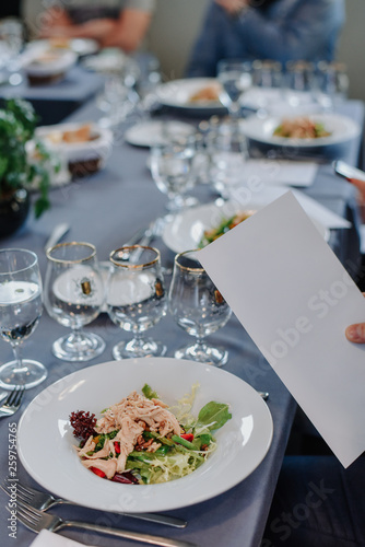 table setting in a restaurant with blank space on menu