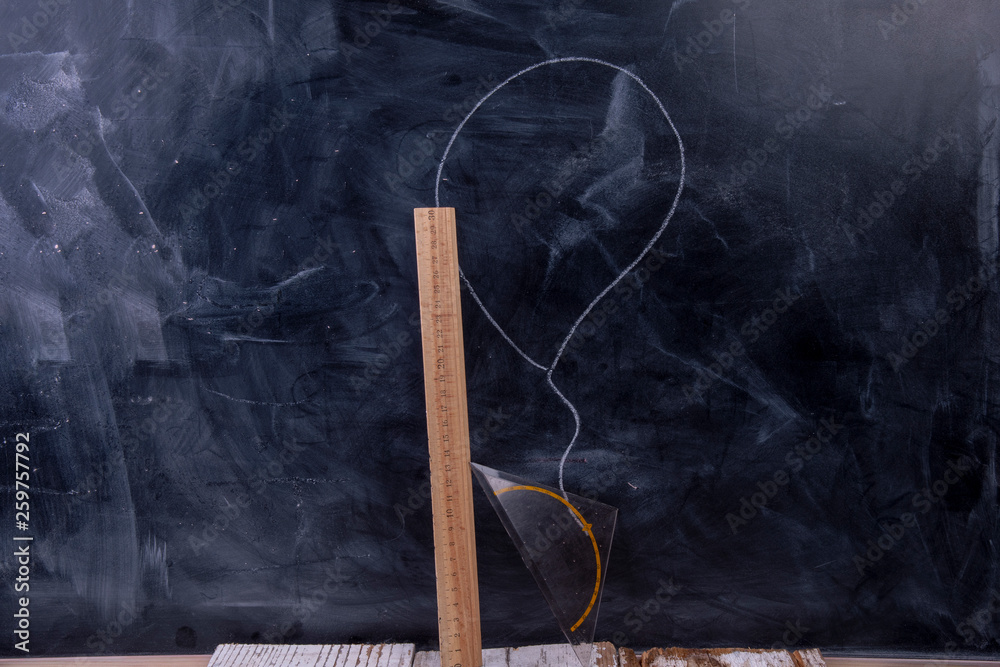 Ruler on the board with a drawn balloon Ruler on the board with a drawn balloon