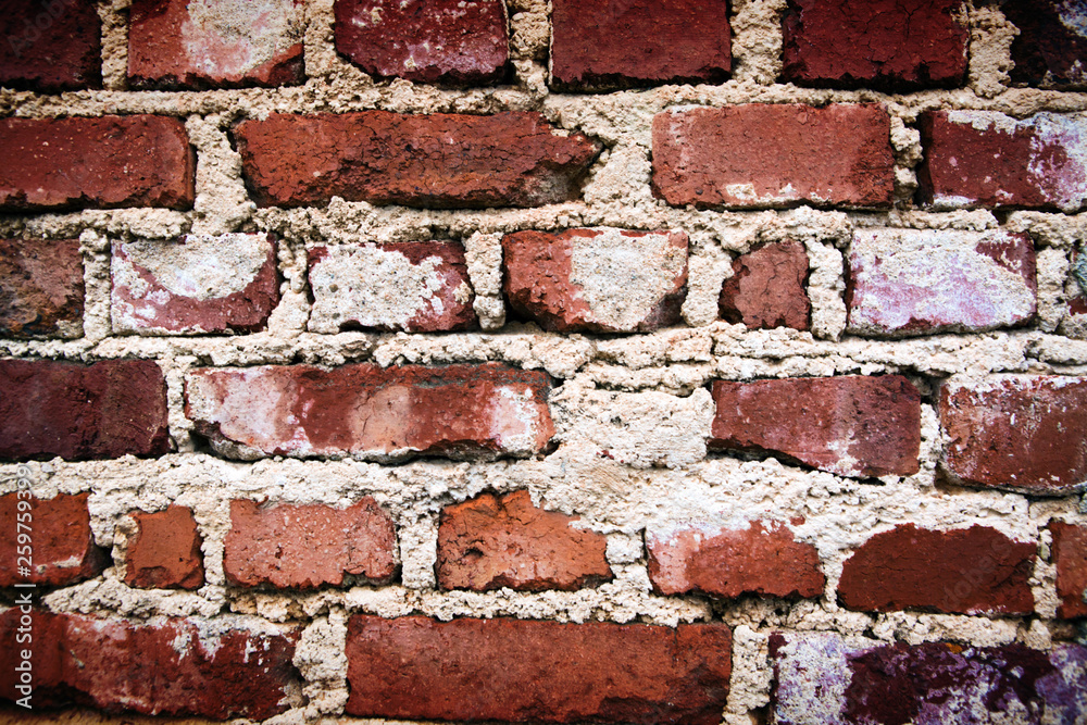 Red brick wall texture grunge background with vignette corners .