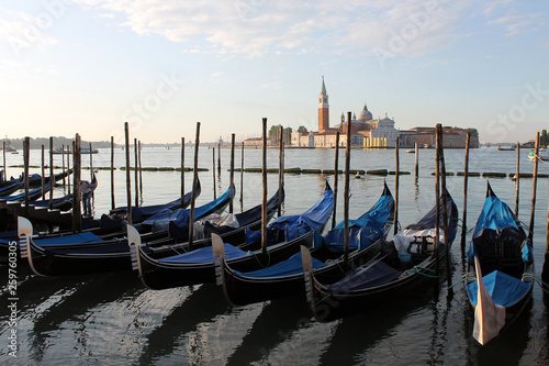 View of the island of San Giorgio Maggiore in Venice Italy with gondolas