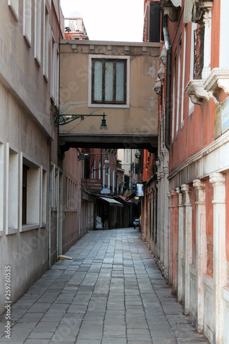 Narrow old street in Venice Italy