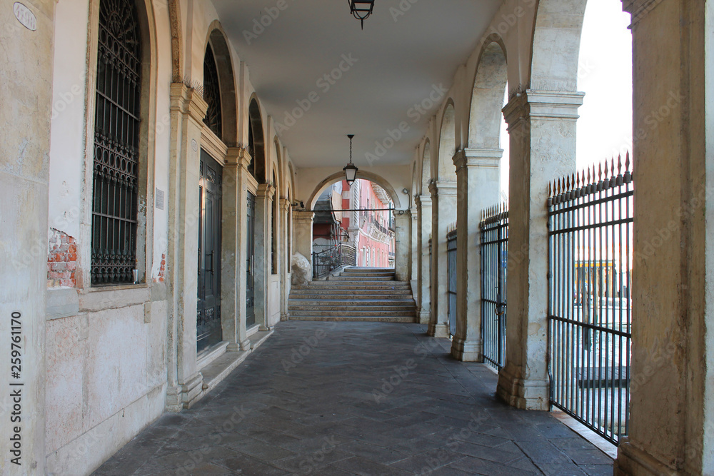 Gallery with columns in the street Venice Italy