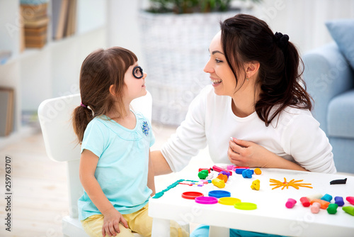 How to save healthy eyesight. Mom and daughter make glasses from plasticine