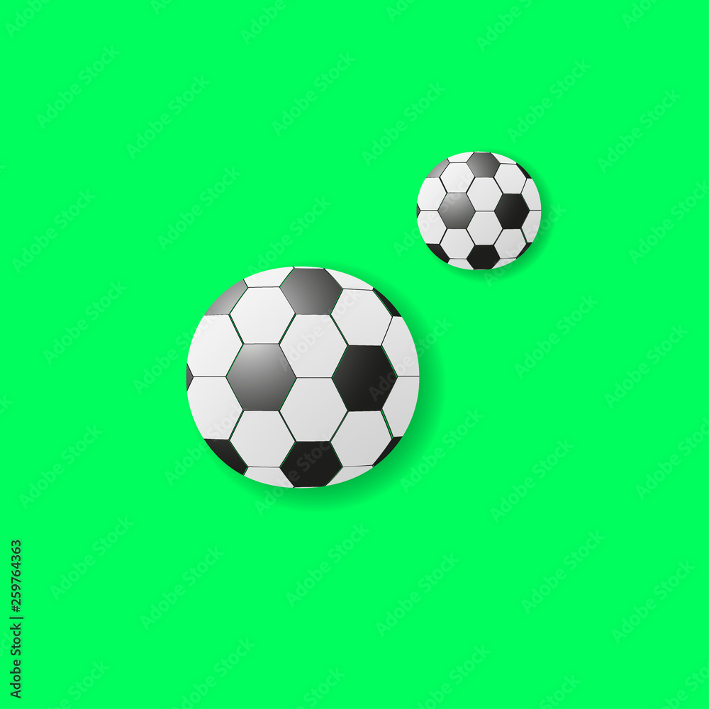 Soccer balls on a green background