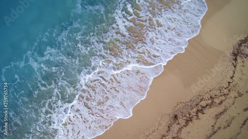 Drone aerial view on a beautiful clear beach in the Ionian sea