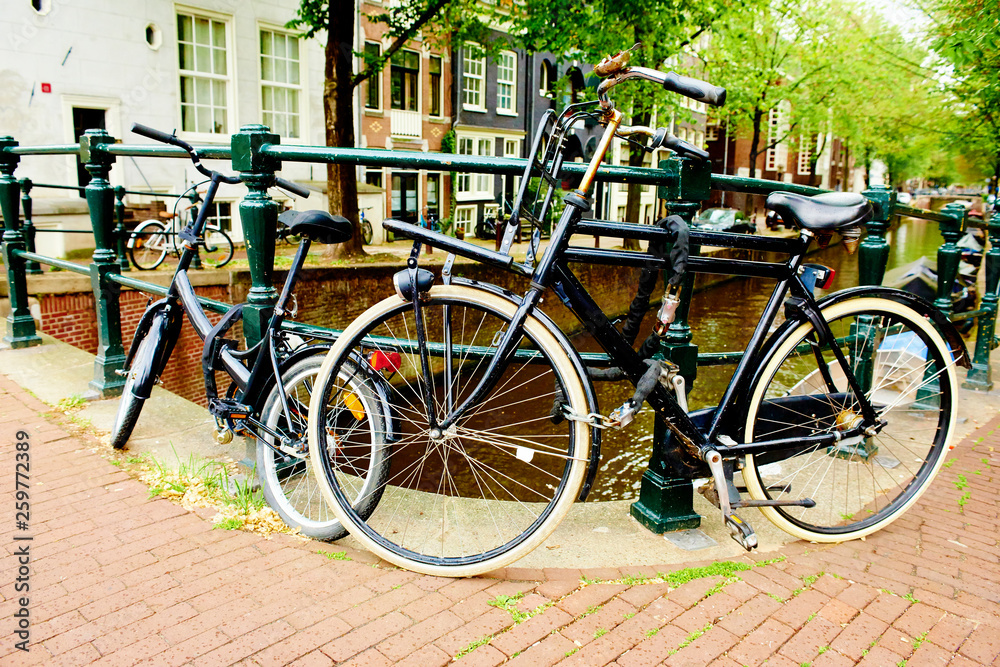 Bicycles parked on street in Amsterdam, The Netherlands
