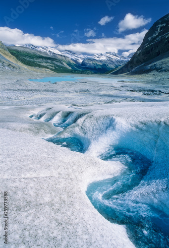 Melt water channel winding down Saskatchewan Glacier, Banff National Park, Alberta, Canada