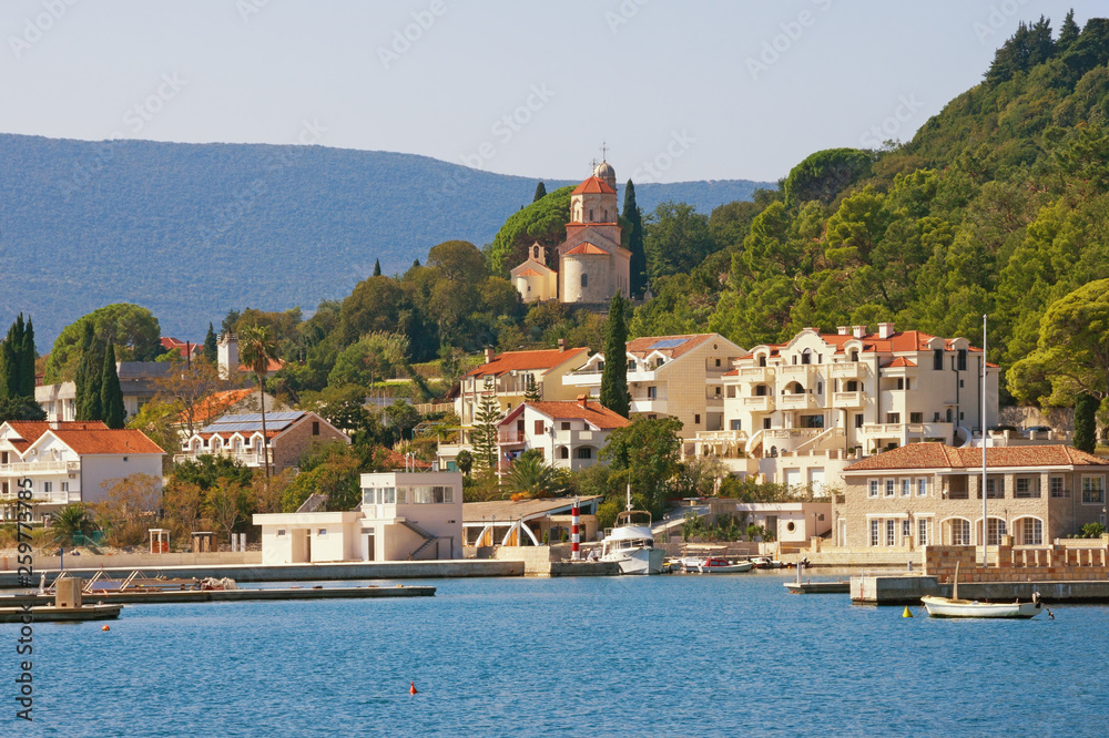 Beautiful Mediterranean landscape. Montenegro, Bay of Kotor. View of Herceg Novi city and Savina Monastery on sunny autumn day
