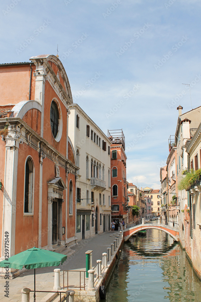 Narrow water channel in Venice Italy