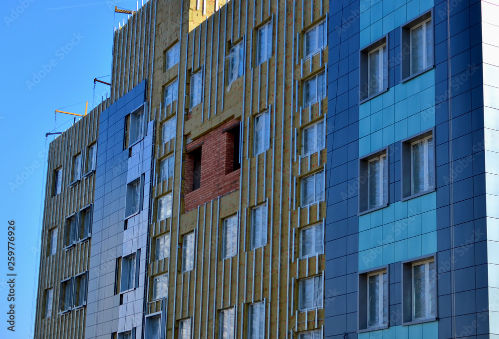 Image showcasing Facing of the building ventilated facade. Aluminum colored facades ...