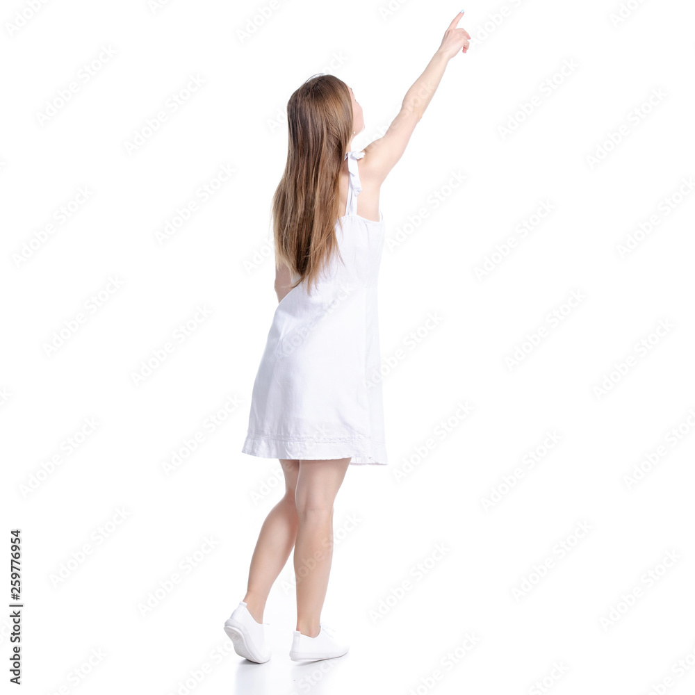 Woman in white dress showing pointing on white background isolation, back view Woman in white dress showing pointing on white background isolation, back view
