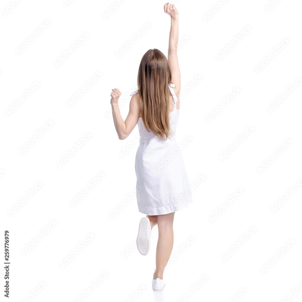 Woman in blue dress standing hands up wining on white background isolation, back view Woman in blue dress standing hands up wining on white background isolation, back view