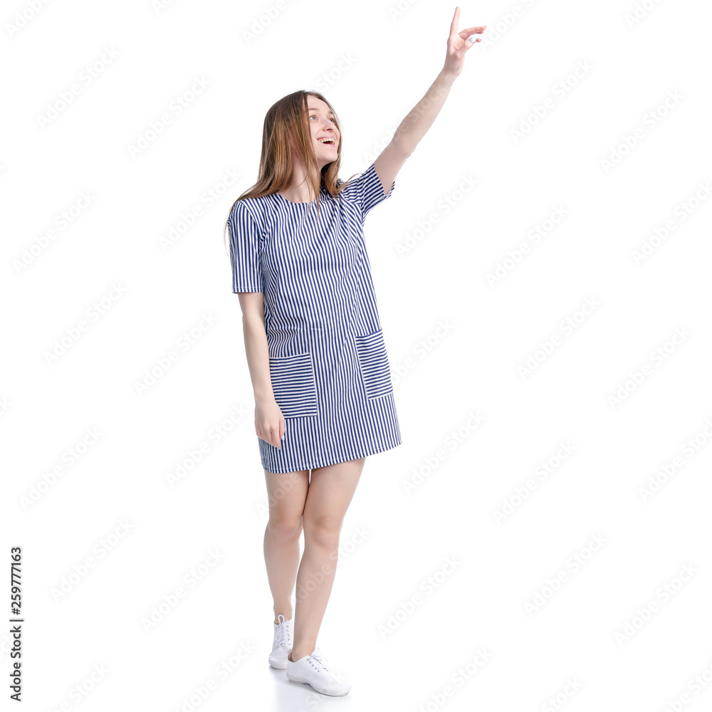 Woman in blue dress showing pointing on white background isolation