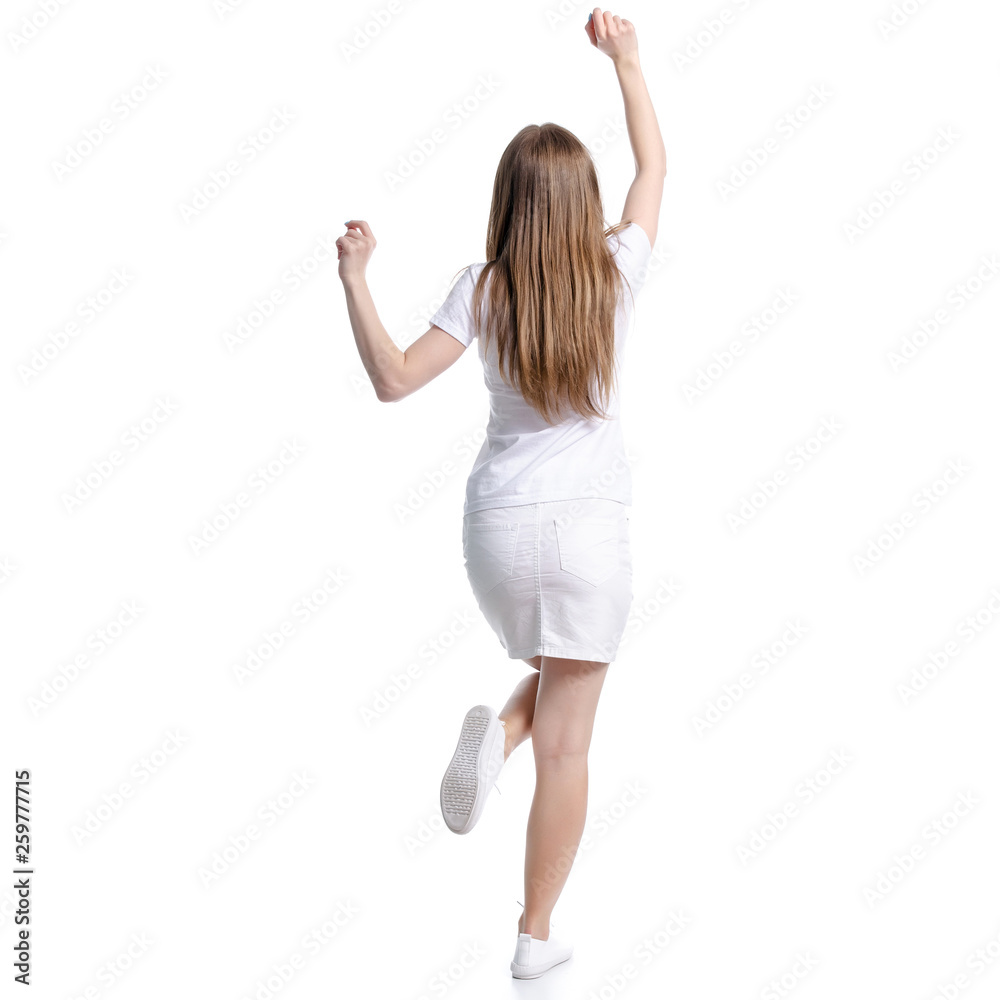 Woman in white t-shirt and skirt happiness dancing on white background isolation, back view Woman in white t-shirt and skirt happiness dancing on white background isolation, back view