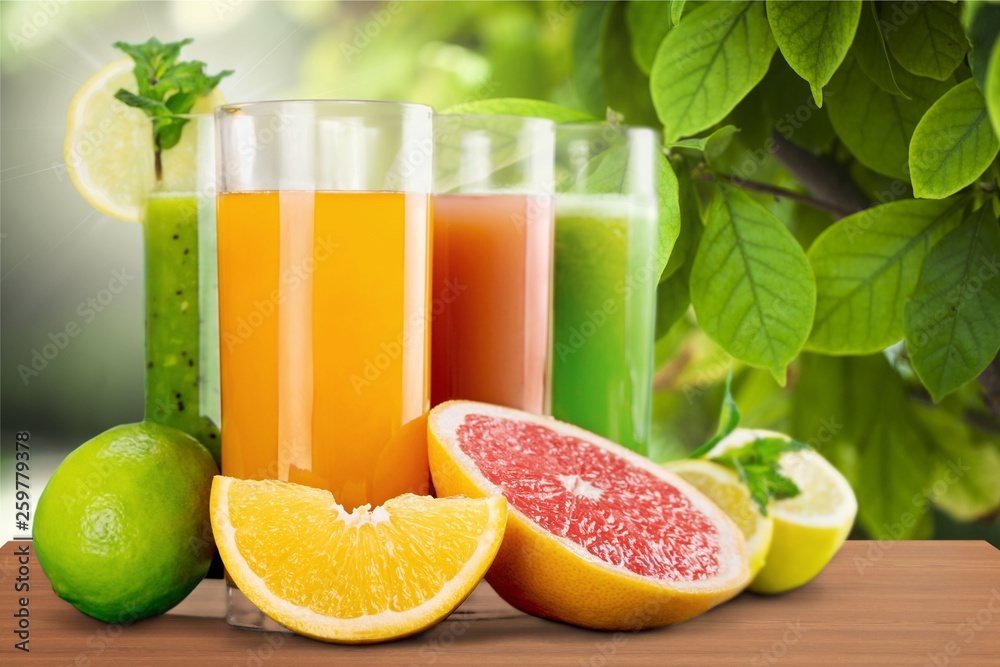 Orange juice and slices of orange on background Orange juice and slices of orange on background