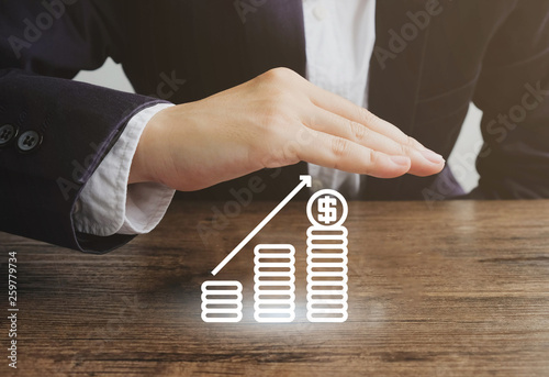 Businessman with stack of coin icon.Money protection concept.