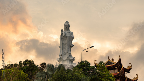 Ho quoc pagoda in phu Quoc island. Monument of Lady buddha in a beautiful sunset in Vietnam