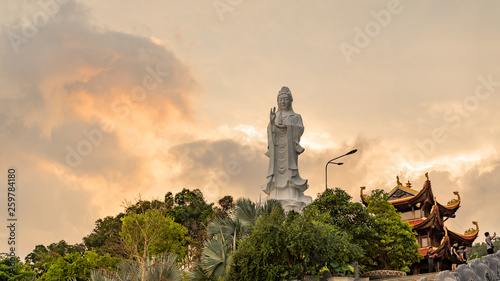 Ho quoc pagoda in phu Quoc island. Monument of Lady buddha in a beautiful sunset in Vietnam