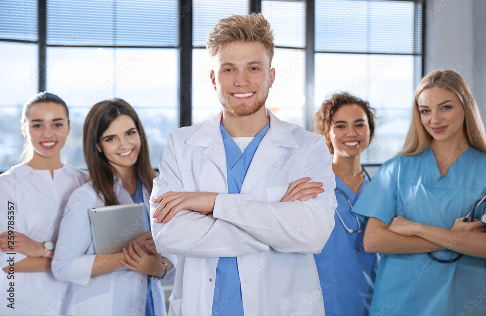 Smart medical student with his classmates in college Smart medical student with his classmates in college