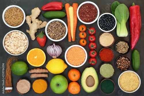 Fototapeta Naklejka Na Ścianę i Meble -  Liver detox super food concept with fruit, vegetables, herbs, spices, grains, seeds, cereals, herbal medicine and supplement powders. Health foods high in antioxidants, vitamins &  dietary fibre.  