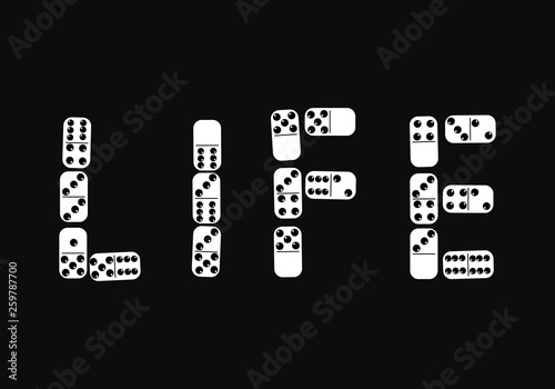 Word LIFE made from domino bones.Flat lay