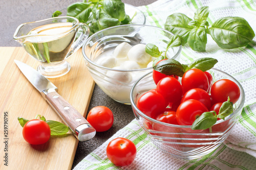 Caprese Salad. Tomatoes, basil, mozzarella and oil.