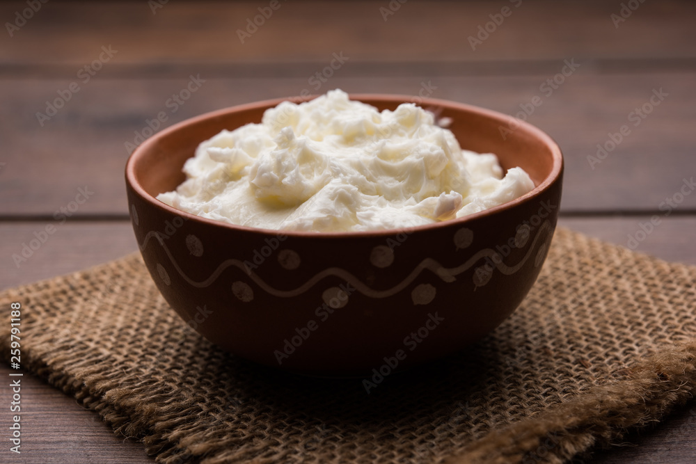 Homemade white Butter or Makhan/Makkhan in Hindi, served in a bowl. selective focus Homemade white Butter or Makhan/Makkhan in Hindi, served in a bowl. selective focus