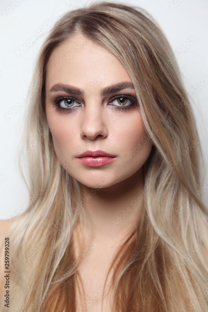 Young beautiful woman with smoky eye make-up Young beautiful woman with smoky eye make-up