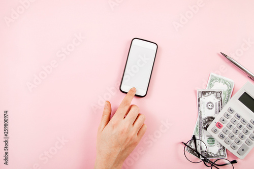 Person hand using moile phone with payment concept photo