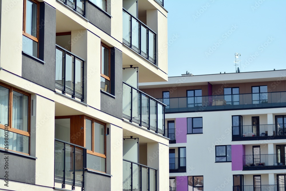 European modern residential architecture. Fragment of a modern apartment building in front. Very modern apartment house. European modern residential architecture. Fragment of a modern apartment building in front. Very modern apartment house.