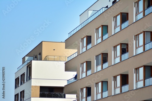 European modern residential architecture. Fragment of a modern apartment building in front. Very modern apartment house. 