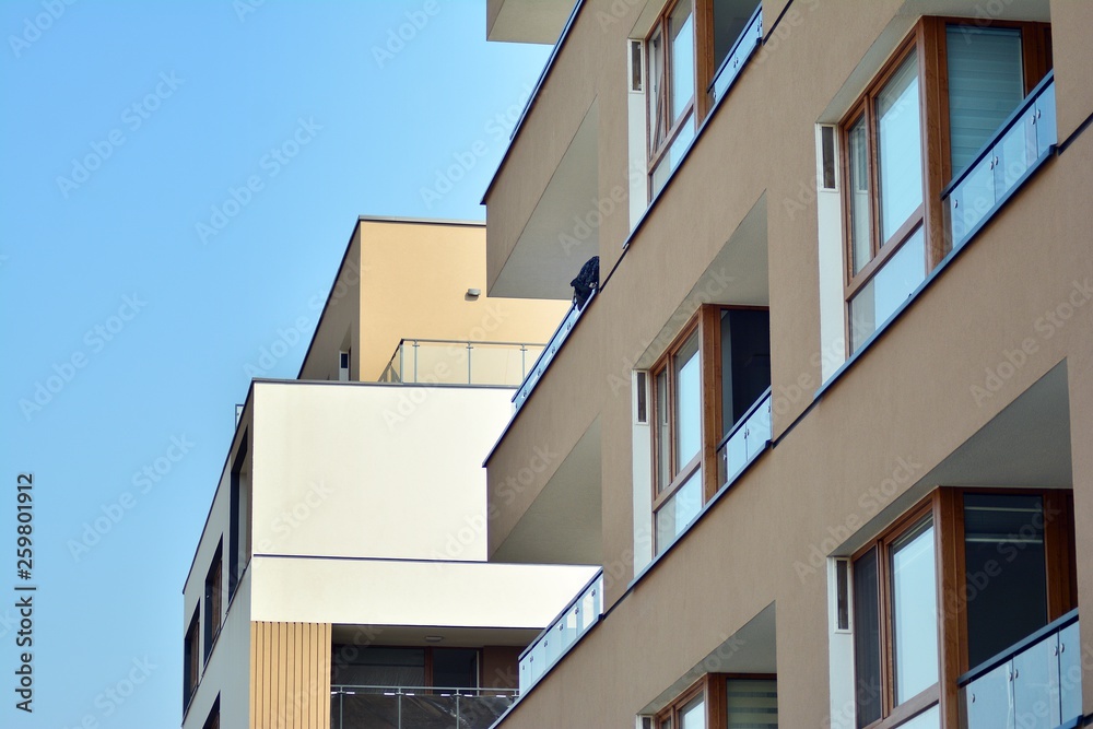 European modern residential architecture. Fragment of a modern apartment building in front. Very modern apartment house. European modern residential architecture. Fragment of a modern apartment building in front. Very modern apartment house.
