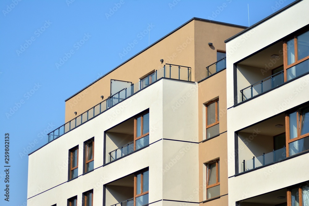 European modern residential architecture. Fragment of a modern apartment building in front. Very modern apartment house. European modern residential architecture. Fragment of a modern apartment building in front. Very modern apartment house.