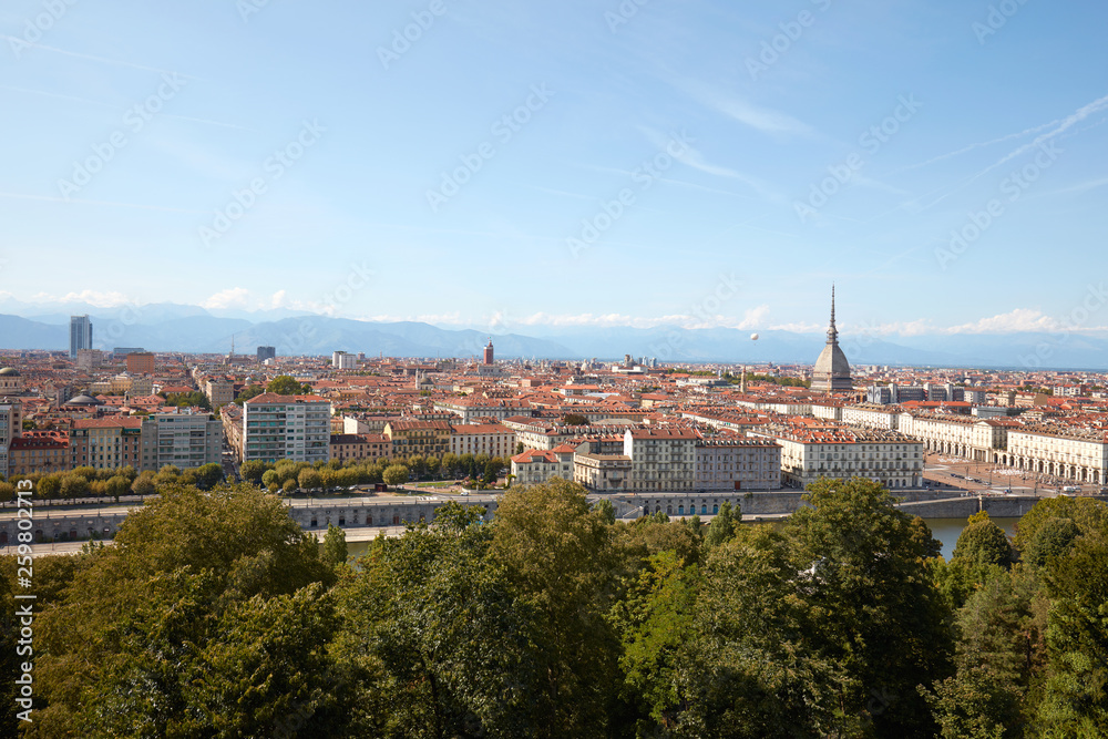 Turin skyline panorama view and Mole Antonelliana tower in a sunny summer day in Italy