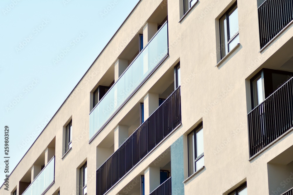 European modern residential architecture. Fragment of a modern apartment building in front. Very modern apartment house. 