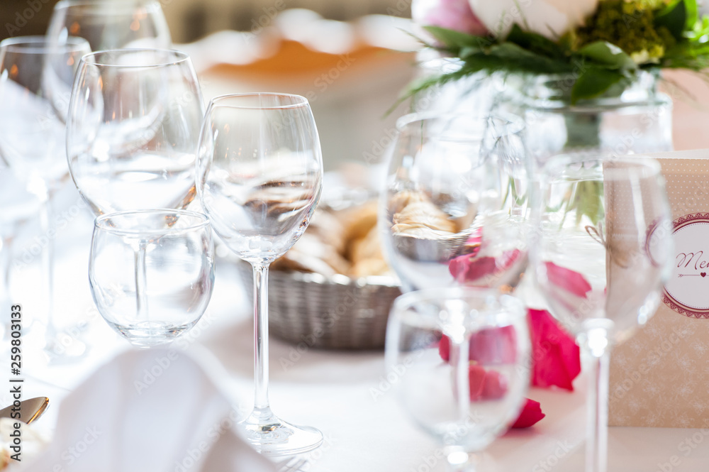 multiple empty glasses on table in bright atmosphere multiple empty glasses on table in bright atmosphere