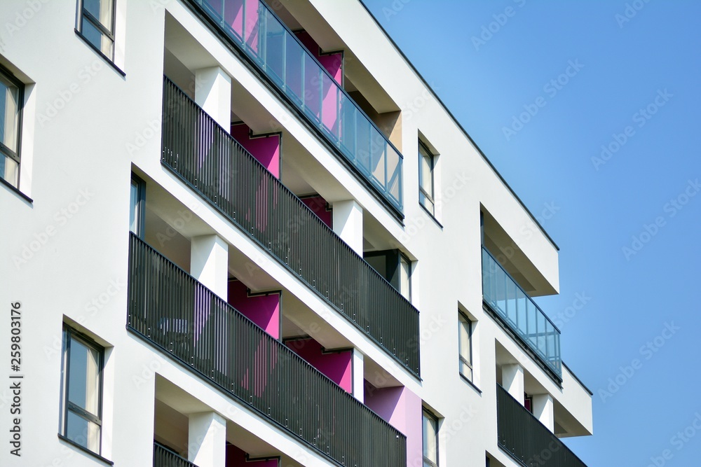 European modern residential architecture. Fragment of a modern apartment building in front. Very modern apartment house. 