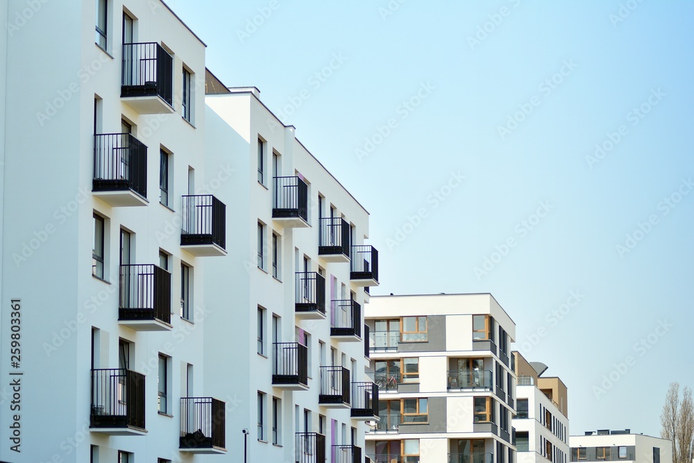 European modern residential architecture. Fragment of a modern apartment building in front. Very modern apartment house. 