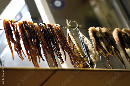 Octopus and fish put to dry in a restaurant in Aliki, a fishing village in Paros