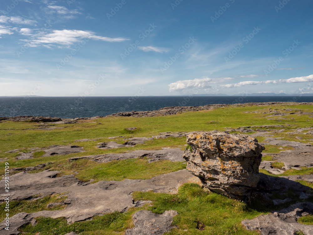 Atlantic ocean, West coast of Ireland. Burren region, Sunny day, Rock and stone plateau.