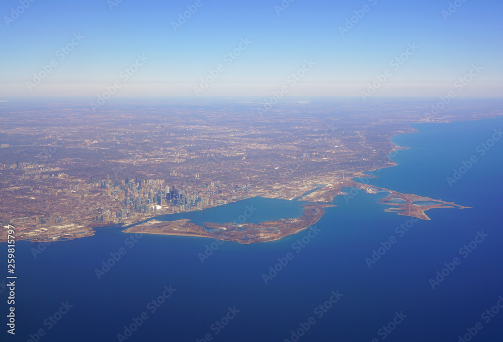 Aerial landscape view of the city of Toronto skyline and Lake Ontario in Ontario, Canada