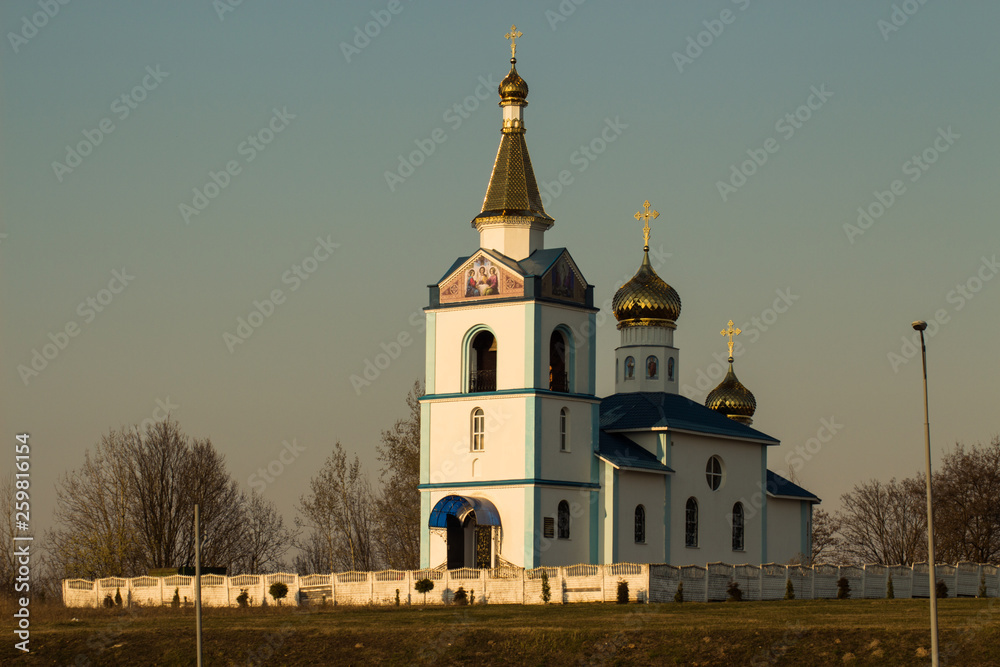 ancient Christian church in the heart of the industrial city at morning.