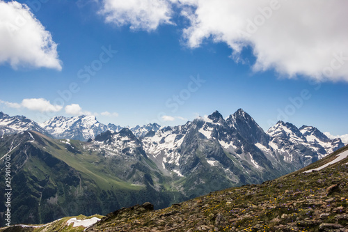 Alpine meadows and rocks in the Caucasus mountains in Russia