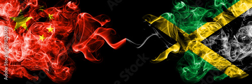 China vs Jamaica, Jamaican smoke flags placed side by side. Thick colored silky smoke flags of Chinese and Jamaica, Jamaican