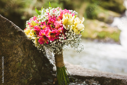 details of a bridal bouquet for wedding in the field.