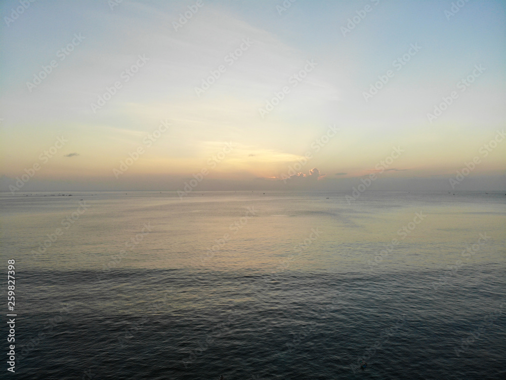 Sunset over the ocean in Bali, colorful down over the sea, Colorful sunset over the sea Bali, Indonesia