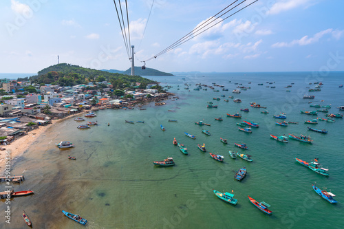 Top view of the bay with fishing boats and the An Thoi city.