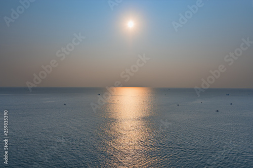 Fototapeta Naklejka Na Ścianę i Meble -  The Scenic sunset over the sea bay. view from above